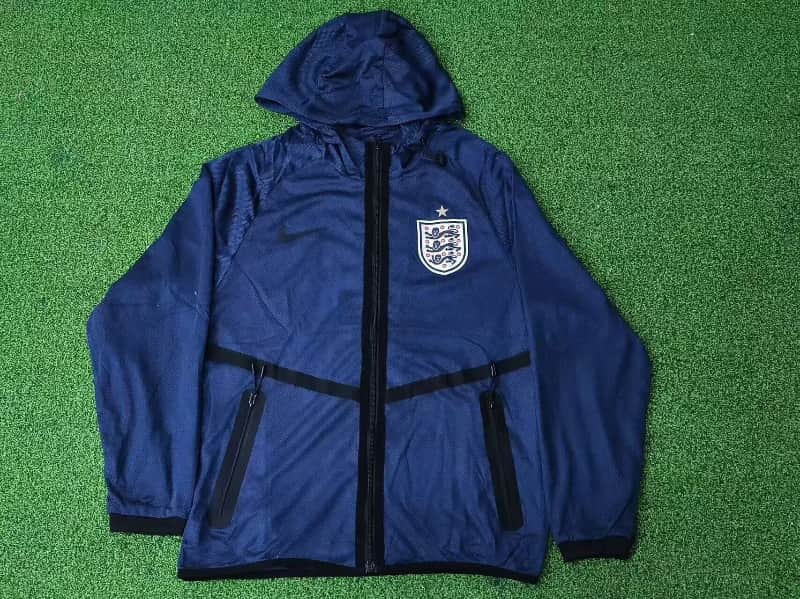Thailand Quality(AAA) 2026 England Dark Blue Soccer Windbreaker 03 Thailand Quality(AAA) 2026 England Dark Blue Soccer Windbreaker 03